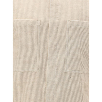 Close-up of Rick Owens Cream Cotton Shirt showing corduroy texture and two front patch pockets, part of the AW25 collection.
