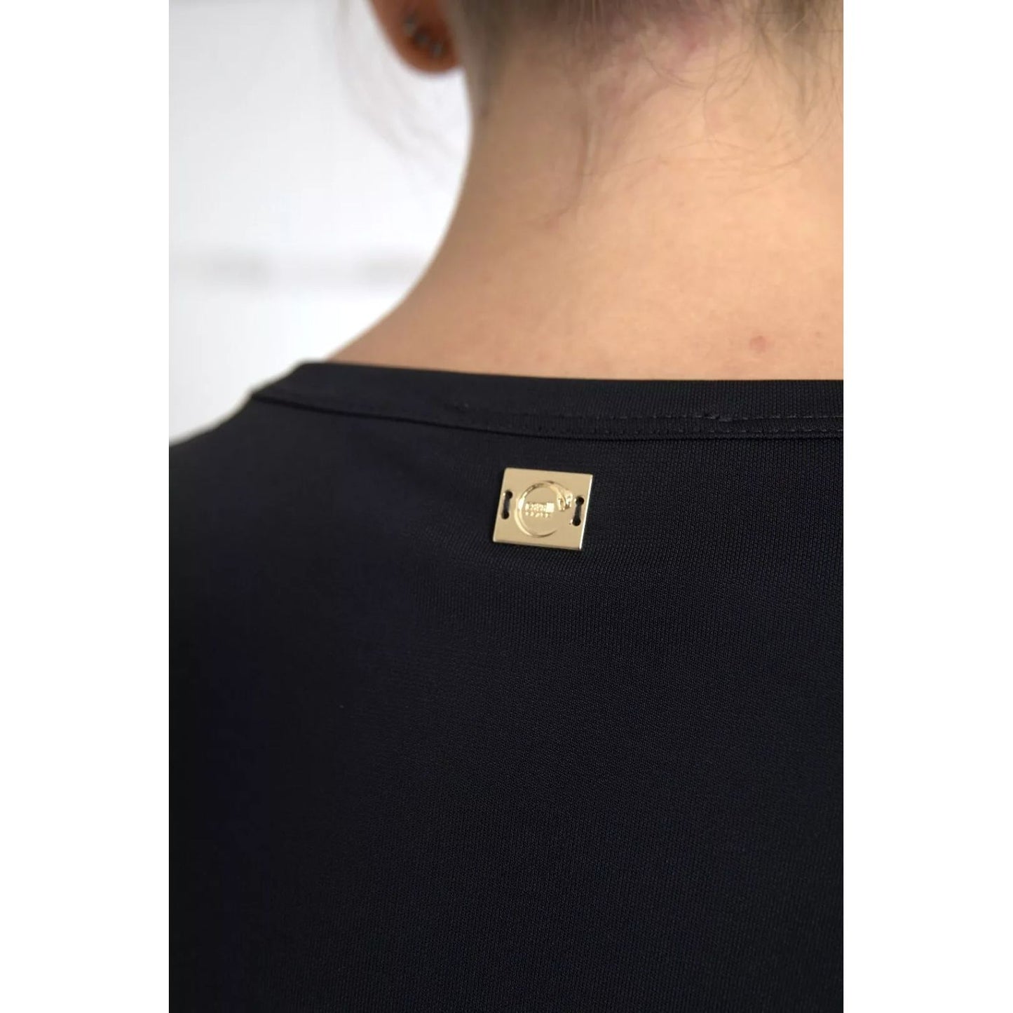 Close-up of Roberto Cavalli Black Viscose Round Neck CLASS T-shirt with logo detail on the back.