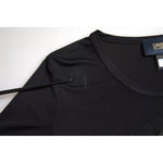 Close-up of Roberto Cavalli Black Viscose Round Neck CLASS T-shirt with repaired rip detail.