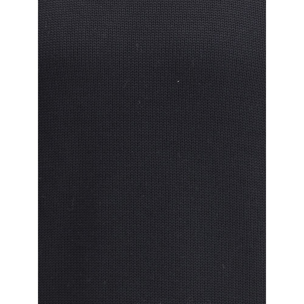 Close-up of Roberto Collina Black Merino Wool Turtleneck fabric texture showcasing fine knit details.
