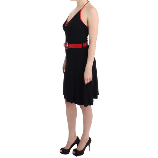 Woman wearing Roccobarocco Black belted palladio dress, knee-length with red belt and sleeveless design