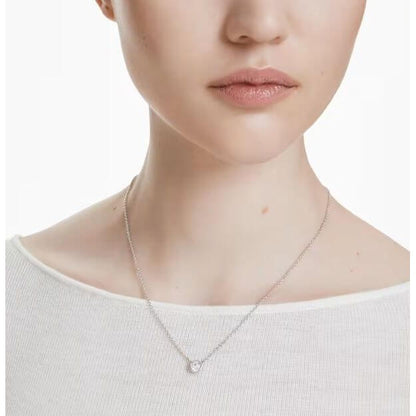 SWAROVSKI Mod. 5696039 Imber Rhodium Plated Necklace on model, round-cut stone, minimalist design