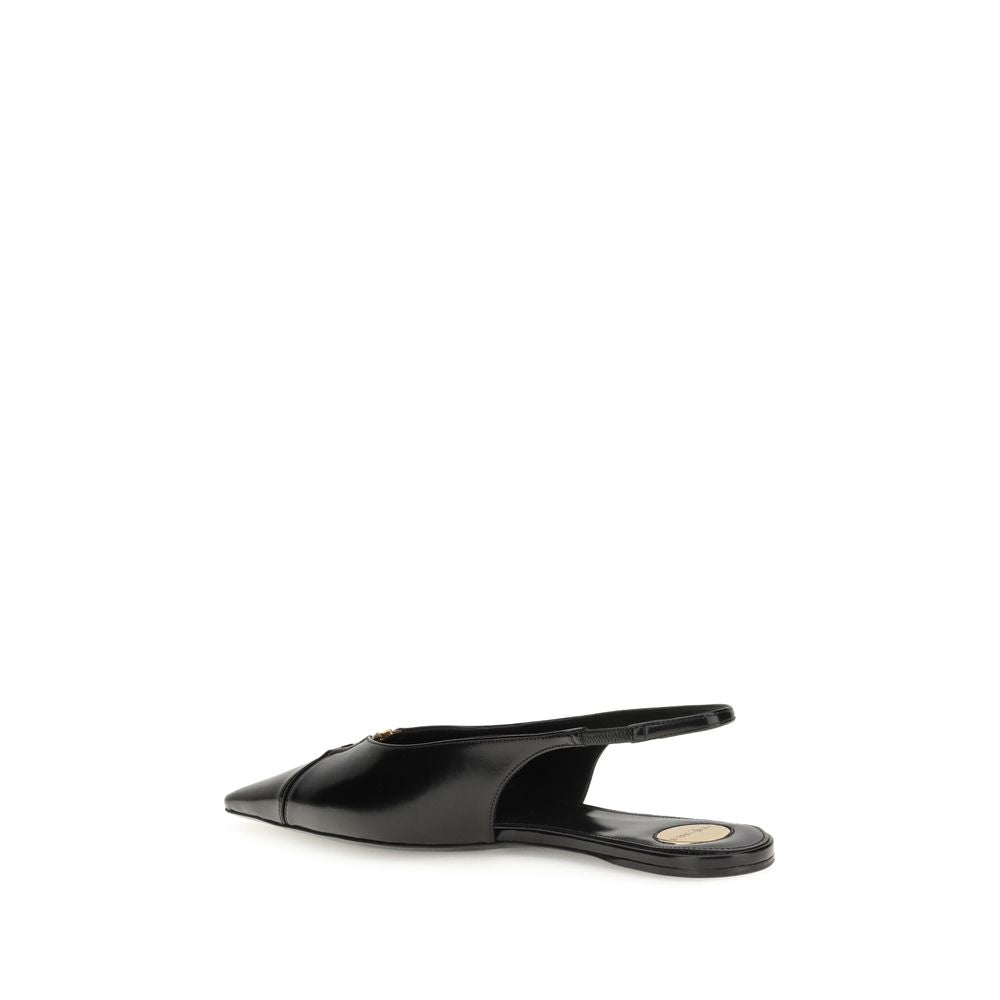 Saint Laurent Black Calf Leather Bos Taurus Ballet Flats with bronze CASSANDRE detail and sleek design