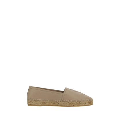 Saint Laurent Brown Lamb Ovis Aries Aries Espadrilles, flat sole, rope detail, elongated toe, slip-on style, monogrammed front.