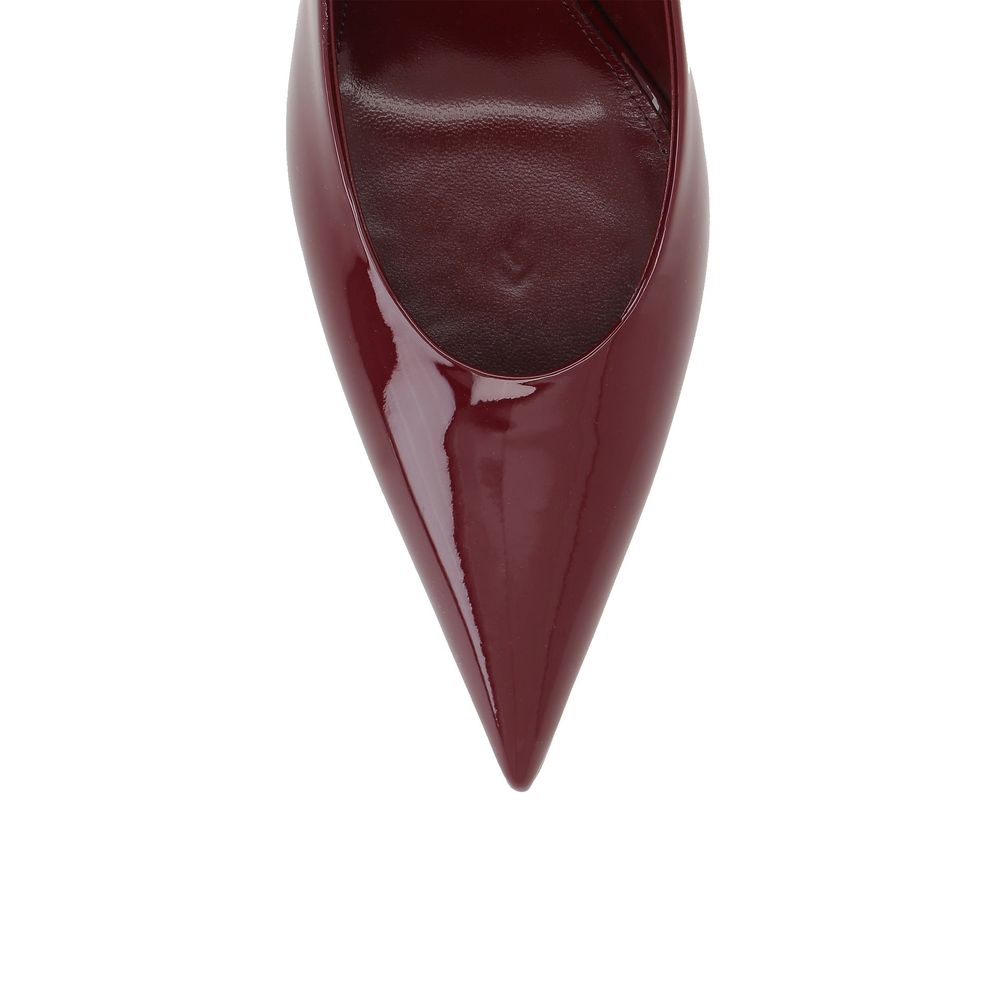 Top view of Saint Laurent Red Calfskin Platform Pumps, showing pointed toe and patent leather finish.