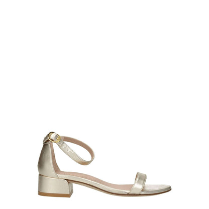 Alt Tag: Stuart Weitzman Gold Leather Sandals with mid heel and buckle closure, featuring an open toe design and metallic platinum accents.