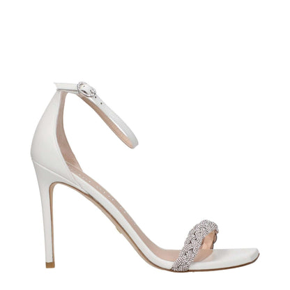 Stuart Weitzman White Leather Stiletto Heel Sandals with buckle closure and rhinestone detail, open toe, and 10cm high heel.