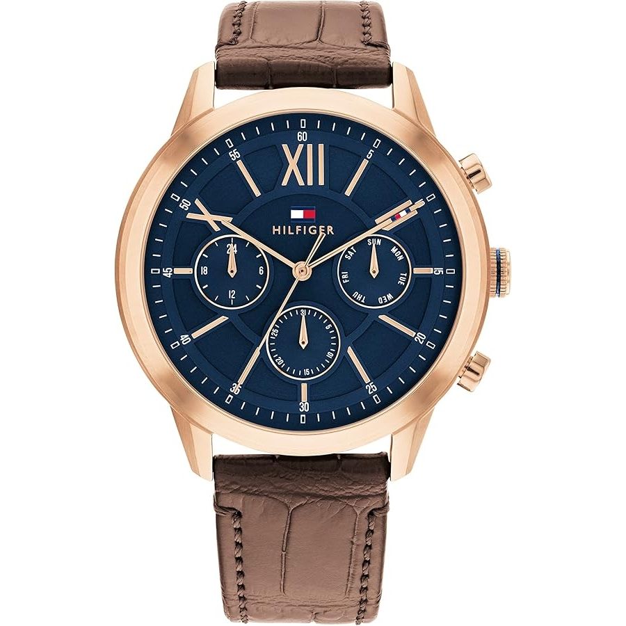 Elegant TOMMY HILFIGER Mod. 1710526 gent's quartz analog watch with brown leather strap, blue dial, and official packaging.