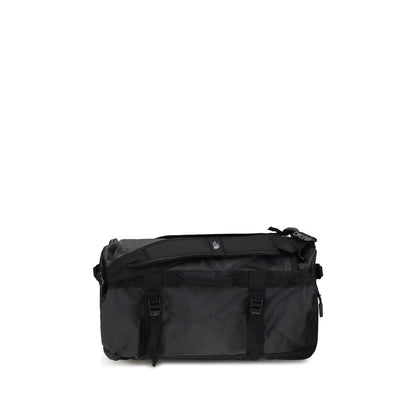 The North Face Black Nylon Luggage And Travel bag, durable and versatile with padded handles, made of recycled waterproof materials.