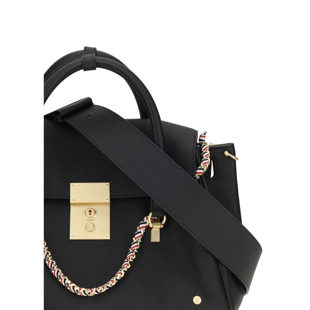 Thom Browne Black Calf Leather Bos Taurus Handbag with brass padlock and ribbon shoulder strap.