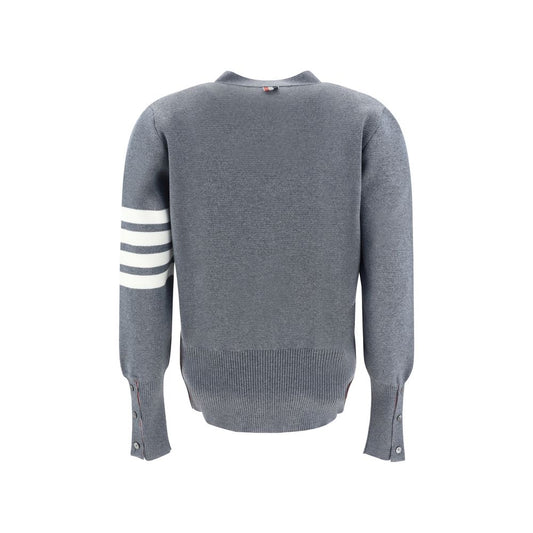 Back view of Thom Browne Cardigan with striped cuff and iconic logo bands on left arm, fleece wool, adjustable hem, AW25 edition.
