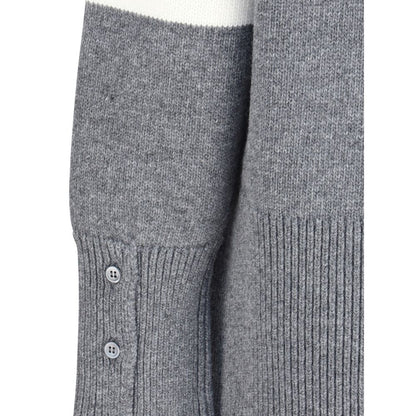 Close-up of Thom Browne Gray Fleece Wool Sweatshirt showing ribbed cuffs and side buttons.