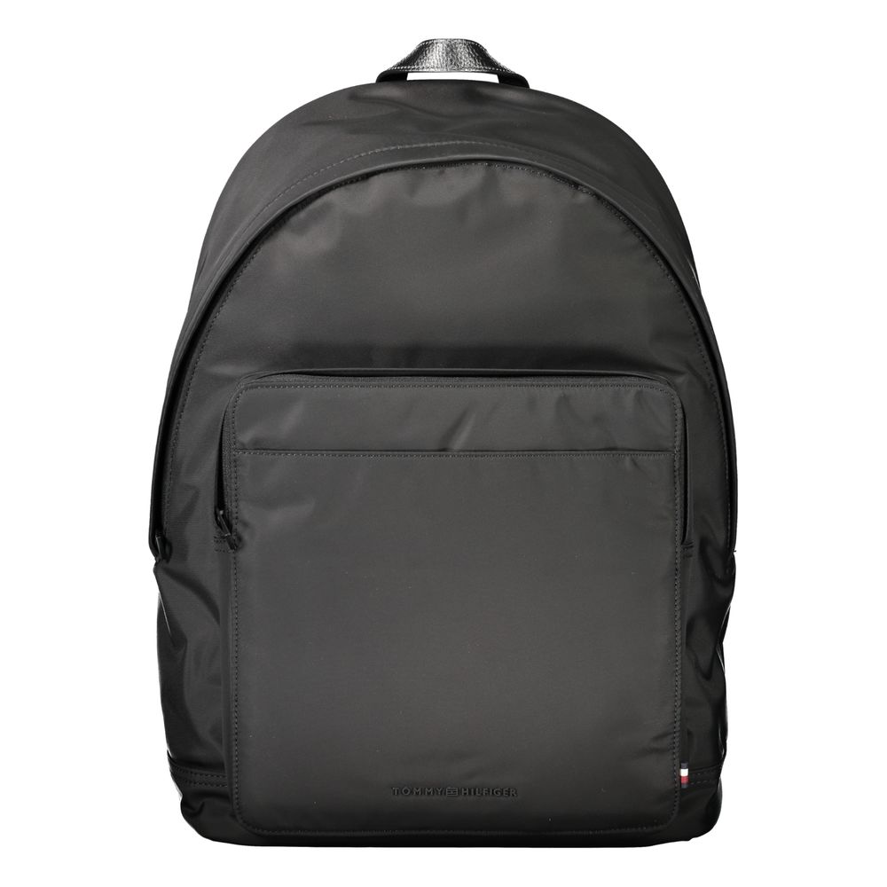 Tommy Hilfiger Black Polyester Backpack with adjustable straps and laptop compartment, featuring a zip closure and logo detail.