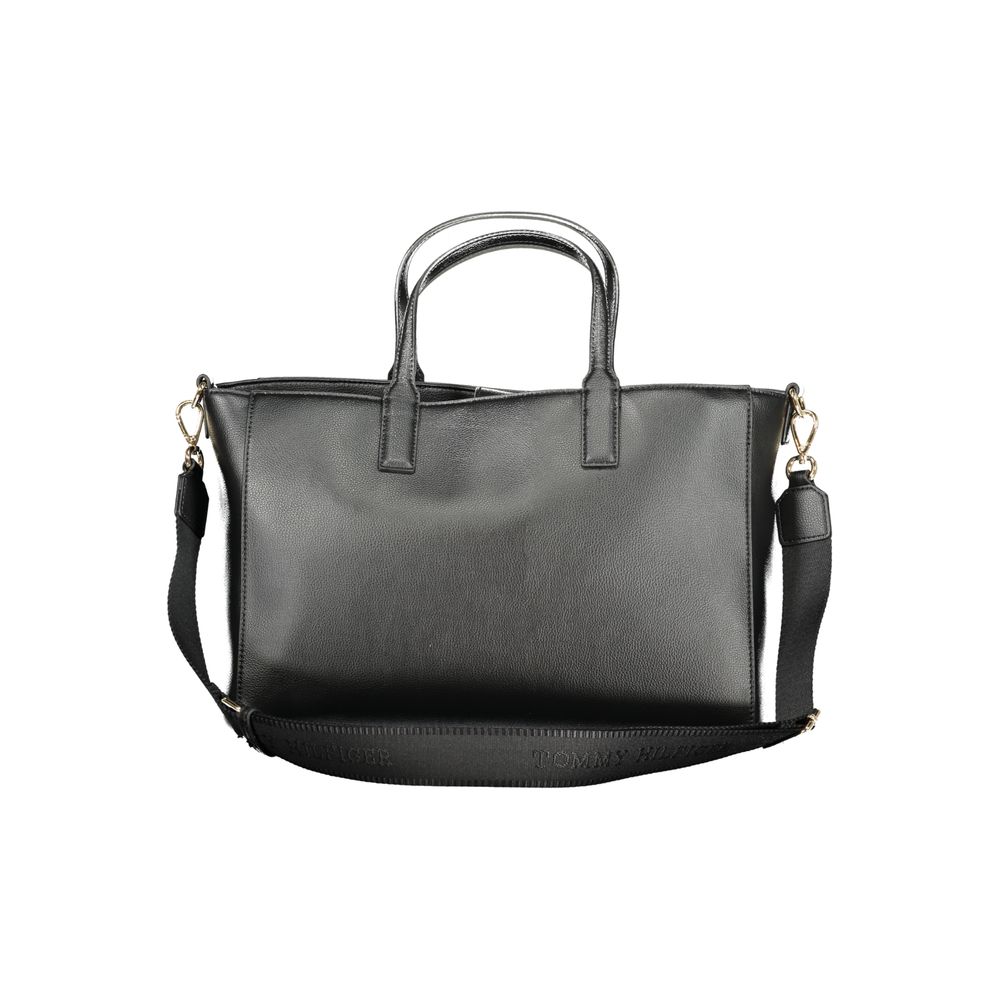 Tommy Hilfiger Black Polyester Women Handbag with removable shoulder strap and two handles, featuring eco-friendly design.
