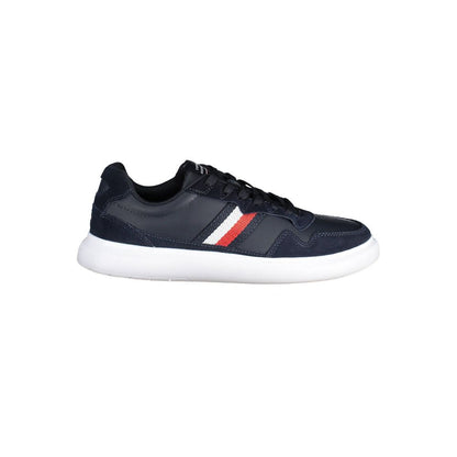 Tommy Hilfiger Blue Leather Men Sneaker with iconic logo and contrasting details, offering style and comfort, side view.