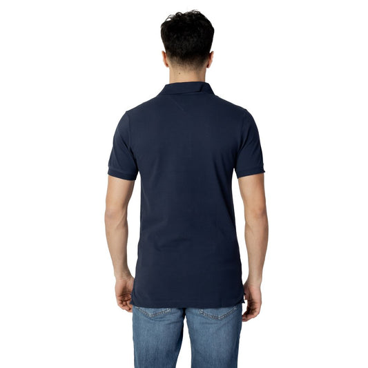 Back view of a model wearing a Tommy Hilfiger Jeans Blue Cotton Polo Shirt, showcasing the slim-fit design and short sleeves.