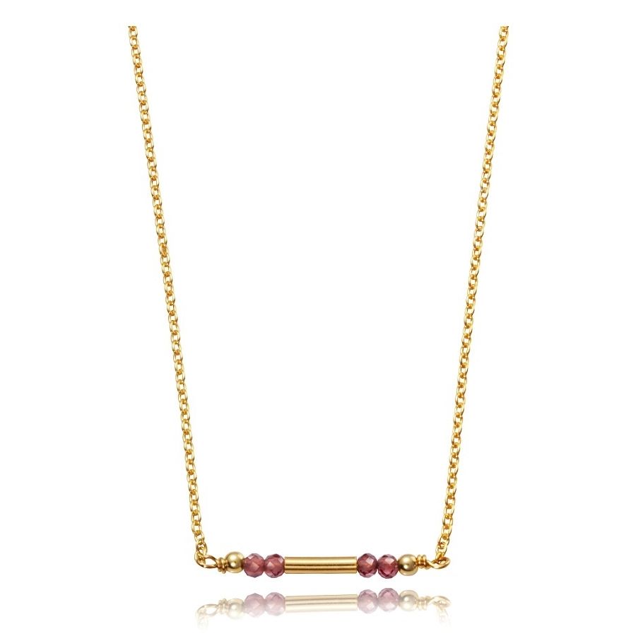 Gold necklace with small pink beads, featuring a minimalist design.
