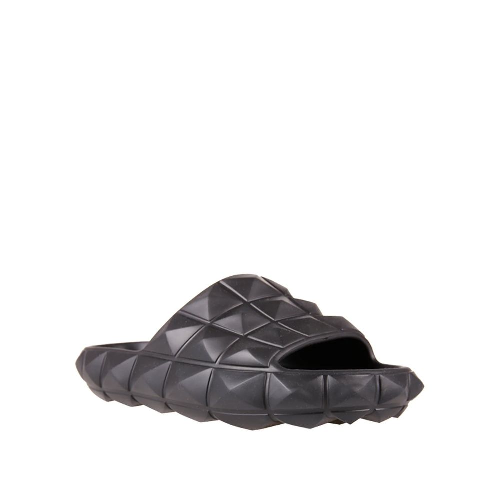 Alt Tag: Valentino Garavani Black Rubber Slippers with studded design, open toe, all-rubber construction, designed for men, made in Italy