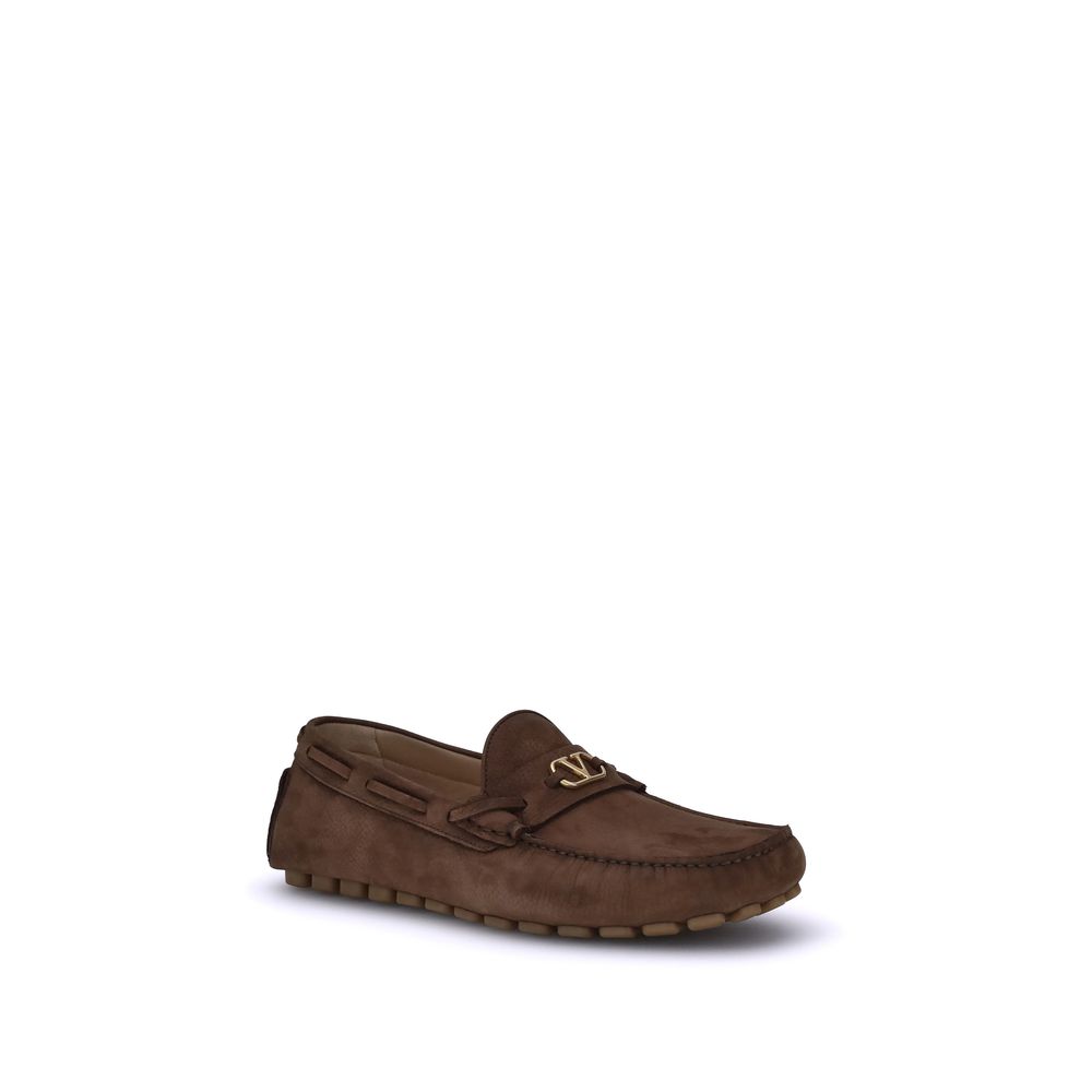 Valentino Garavani Brown Rubber Slip-On Loafers with VLogo plaque and notched sole for grip.