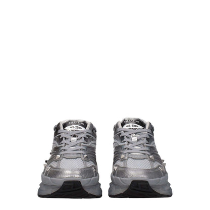 Front view of Valentino Garavani Gray Fabric Athletic Sneakers with studs and lace-up closure, style code F77930.
