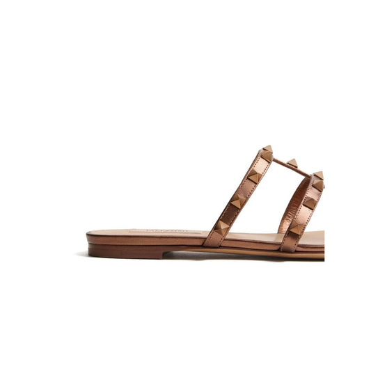 Valentino Garavani Rockstud Low Slide Sandal in Laminated Nappa Leather Sandals
