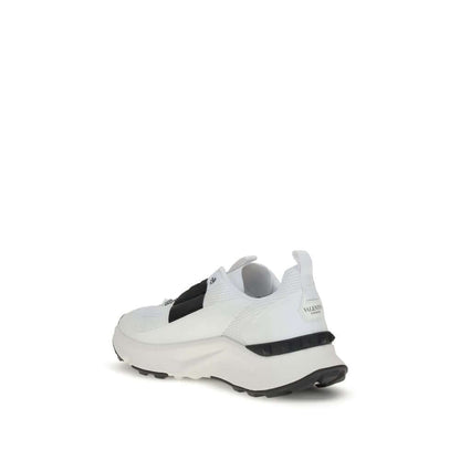 Valentino Garavani White Calf Leather Bos Taurus Athletic Sneakers with studded rubber sole, rear view.