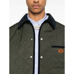 Olive green Valentino Vlogo Signature quilted jacket with contrasting collar and patches.