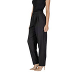 Woman wearing Vila Clothes Black Polyester Pant with high waist and front pleats.