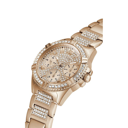 Rose gold GUESS analog watch with crystal embellishments and quartz movement, featuring a stylish round dial and link band.