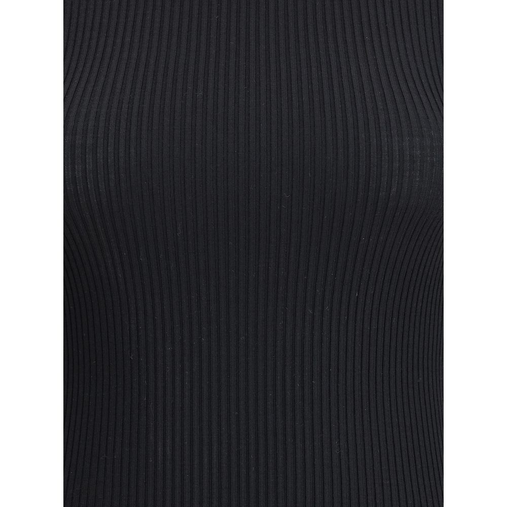 Close-up of Wolford Black Fleece Wool Turtleneck with ribbed texture and slim fit design for seasonal elegance.