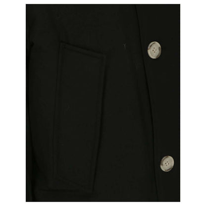 Close-up of Woolrich Black Cotton Parka showing side patch pocket and button details, ideal for AW25.