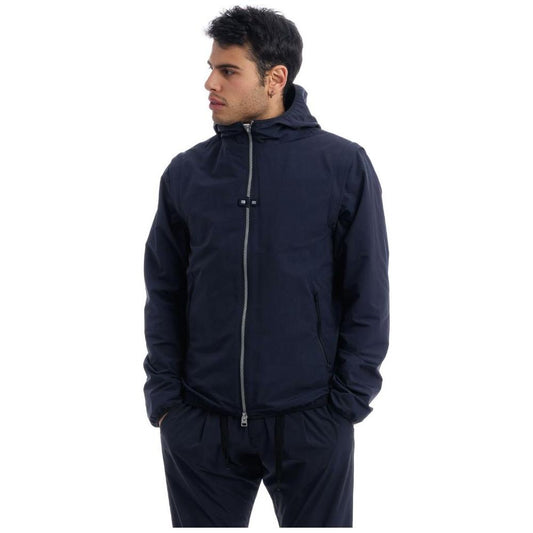 Herno blue nylon jacket with hood, removable sleeves, mesh lining, and side pockets shown worn from front view.